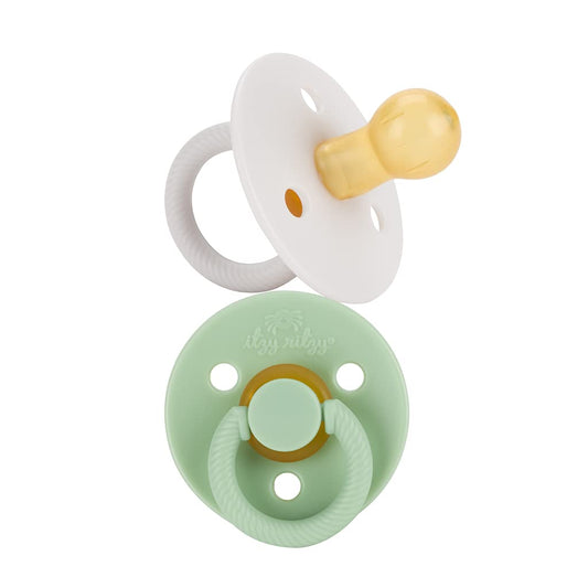 Itzy Ritzy Natural Rubber Pacifiers, Set of 2 – Natural Rubber Newborn Pacifiers with Cherry-Shaped Nipple & Large Air Holes for Added Safety; Set of 2 in Mint & White, Ages 0 – 6 Months