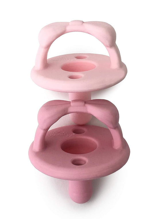 Itzy Ritzy Silicone Pacifiers for Newborn - Sweetie Soother Pacifiers Feature Collapsible Handle & Two Air Holes for Added Safety; for Ages Newborn and Up, Set of 2 in Light Pink & Dark Pink