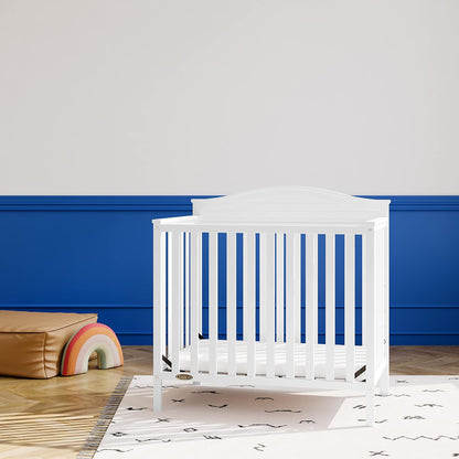 Graco Stella 4-In-1 Convertible Mini Crib with Bonus Mattress (White) – Includes Bonus 2.50 Inch Thick Mattress with Water-Resistant Cover, Converts to Twin Bed with Headboard and Footboard