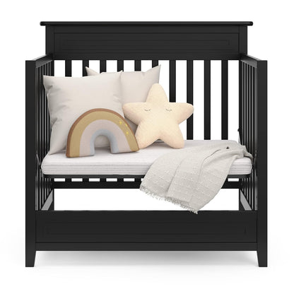 Storkcraft Petal 4-In-1 Convertible Mini Crib (Black) – GREENGUARD Gold Certified, Converts to Daybed and Twin-Size Bed, Includes Bonus 2.75-Inch Mini Crib Mattress