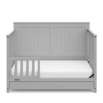 Graco Hadley 5-In-1 Convertible Crib with Drawer (Pebble Gray) – GREENGUARD Gold Certified, Crib with Drawer Combo, Full-Size Nursery Storage Drawer, Converts to Toddler Bed, Daybed