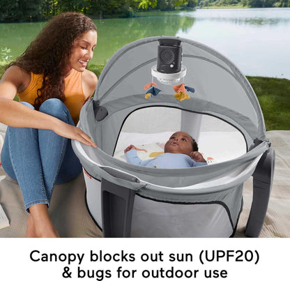 Fisher-Price Portable Baby Bassinet Deluxe On-The-Go Projection Dome, Travel Play Space for Newborns with Lights Music & Canopy, Paper Shapes