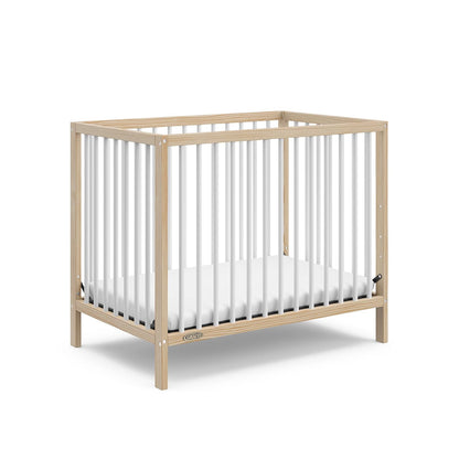 Graco Teddi 4-In-1 Convertible Mini Crib with Bonus Water-Resistant Mattress (Driftwood) – GREENGUARD Gold Certified, 2.75-Inch Mattress Included, Convenient Size, Easy 30-Minute Assembly