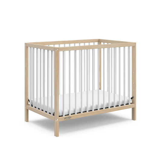 Graco Teddi 4-In-1 Convertible Mini Crib with Bonus Water-Resistant Mattress (Natural with White) – GREENGUARD Gold Certified, 2.75-Inch Mattress Included, Convenient Size, Easy 30-Minute Assembly