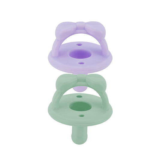 Itzy Ritzy Silicone Pacifiers for Newborn - Sweetie Soother Pacifiers Feature Collapsible Handle & Two Air Holes for Added Safety; for Ages Newborn and Up, Set of 2 in Lilac & Mint