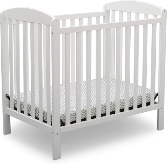 Delta Children Emery Mini Convertible Baby Crib with 2.75-Inch Mattress, Bianca White