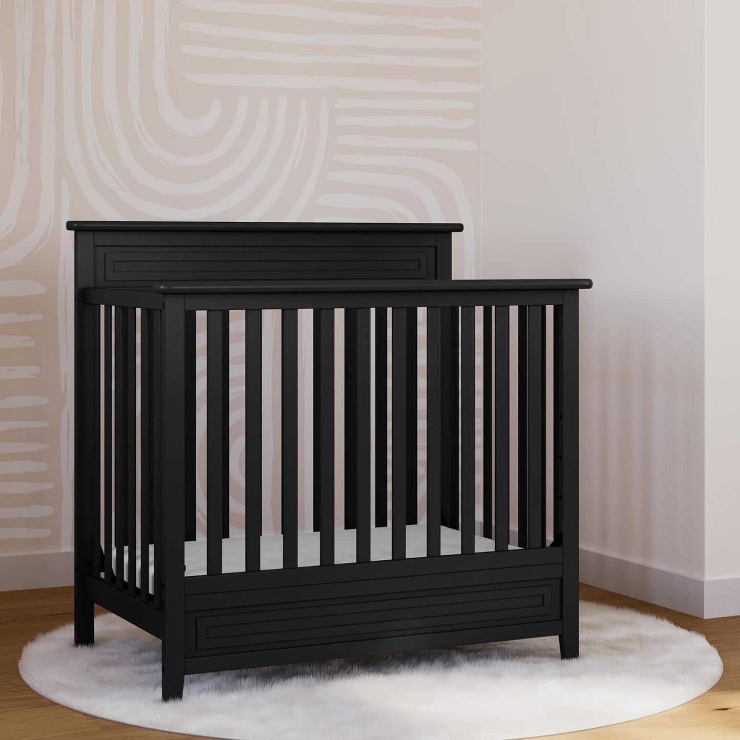 Storkcraft Petal 4-In-1 Convertible Mini Crib (Black) – GREENGUARD Gold Certified, Converts to Daybed and Twin-Size Bed, Includes Bonus 2.75-Inch Mini Crib Mattress